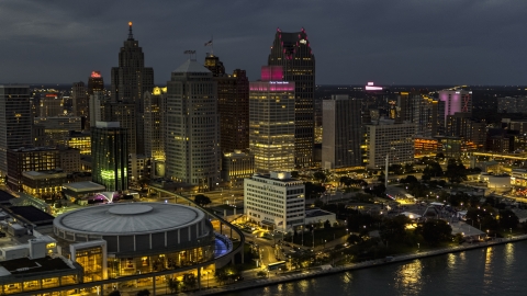 The city's skyscrapers at twilight in Downtown Detroit, Michigan Aerial Stock Photos | DXP002_193_0004