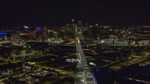 A wide view of the city's skyline at night, Downtown Detroit, Michigan Aerial Stock Photos | DXP002_193_0011