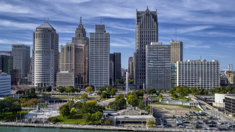 DXP002_196_0002 - Aerial stock photo of A view of towering skyscrapers across from Hart Plaza, Downtown Detroit, Michigan