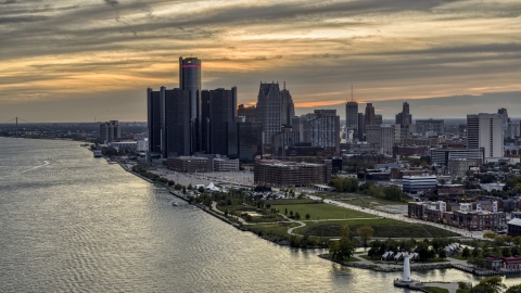 The GM Renaissance Center and the city's skyline seen from river at sunset, Downtown Detroit, Michigan Aerial Stock Photos | DXP002_197_0005