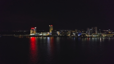 A view of Caesars Windsor hotel and casino across the river at nighttime, Windsor, Ontario, Canada Aerial Stock Photos | DXP002_199_0001