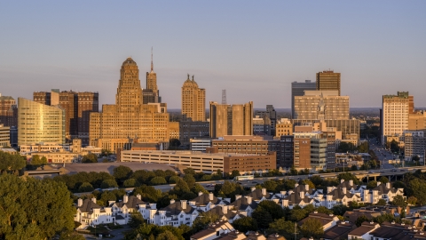 DXP002_204_0001 - Aerial stock photo of City hall beside the Buffalo City Court at sunset, Downtown Buffalo, New York