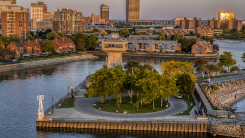 DXP002_204_0010 - Aerial stock photo of A lakeside observation deck at sunset, Buffalo, New York