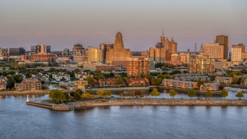 City hall and office buildings at sunset, seen from waterfront condos, Downtown Buffalo, New York Aerial Stock Photos | DXP002_204_0012