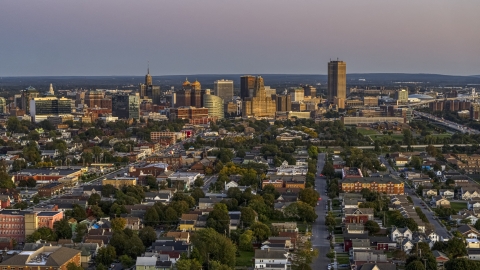 DXP002_204_0016 - Aerial stock photo of Seneca One Tower and the city's skyline at twilight, Downtown Buffalo, New York