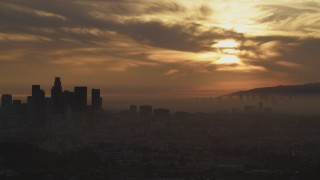 5K aerial stock footage of part of the hazy Downtown Los Angeles skyline at sunset, California Aerial Stock Footage | AF0001_000991