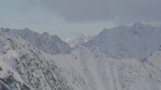 4K aerial stock footage ascend mountain, reveal snow-covered peaks, Chugach National Forest, Alaska Aerial Stock Footage | AK0001_0005