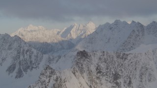 4K aerial stock footage snow-covered Chugach Mountains. low clouds, Chugach National Forest, Alaska Aerial Stock Footage | AK0001_0008