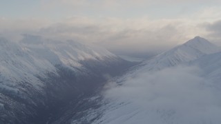 4K aerial stock footage approaching a valley between Chugach Mountains, Chugach National Forest, Alaska Aerial Stock Footage | AK0001_0014