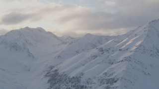 4K aerial stock footage snow covered peaks, clouds, Chugach Mountains, Chugach National Forest, Alaska Aerial Stock Footage | AK0001_0017