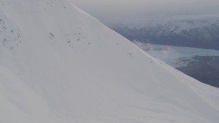 4K aerial stock footage approach snow covered ridge, Chugach Mountains, Chugach National Forest, Alaska Aerial Stock Footage | AK0001_0021