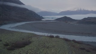 4K aerial stock footage flying low over a river and approaching a glacier, Knik, Alaska Aerial Stock Footage | AK0001_0047