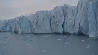 AK0001_0051 - 4K aerial stock footage flying by the edge of a glacier, Knik, Alaska