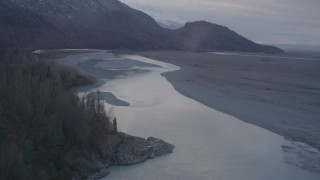 4K aerial stock footage flying over countryside, river, approaching valley, Chugach Mountains, Knik, Alaska Aerial Stock Footage | AK0001_0060