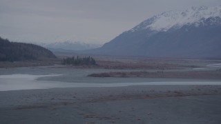 4K aerial stock footage fly over river, foothills, pan to valley, Chugach Mountains, Knik River Valley, Alaska Aerial Stock Footage | AK0001_0062