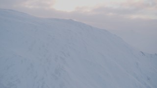 4K aerial stock footage approaching summit of a snowy peak, Chugach Mountains, Alaska Aerial Stock Footage | AK0001_0076