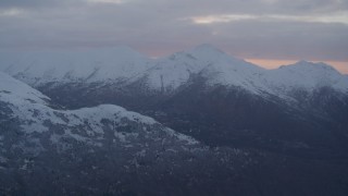 4K aerial stock footage flying over Eagle River, revealing Chugach Mountains, Eagle River, Alaska, sunset Aerial Stock Footage | AK0001_0087