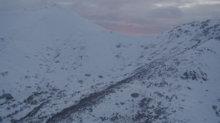 4K aerial stock footage approaching summit of Chugach Mountains, Alaska, sunset Aerial Stock Footage | AK0001_0089