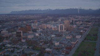 4K aerial stock footage orbit Downtown, Chugach Mountains, Downtown Anchorage, Alaska, twilight Aerial Stock Footage | AK0001_0108