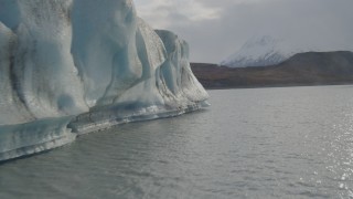 AK0001_0129 - 4K aerial stock footage flying low over Knik River, revealing Knik Glacier, Alaska