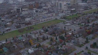 4K aerial stock footage tilt up from neighborhood, revealing downtown buildings, Anchorage, Alaska Aerial Stock Footage | AK0001_0161