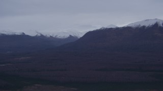 4K aerial stock footage approaching snow capped Chugach Mountains, Alaska Aerial Stock Footage | AK0001_0178