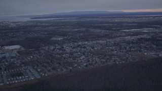 4K aerial stock footage flying away from Anchorage, Knik Arm of the Cook Inlet, Anchorage, Alaska, twilight Aerial Stock Footage | AK0001_0180