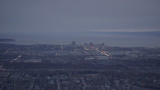 4K aerial stock footage near Debarr Road, flying by Downtown Anchorage, Alaska, twilight Aerial Stock Footage | AK0001_0182