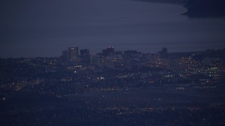 4K aerial stock footage of a view of Downtown Anchorage and Merrill Field, Alaska, night Aerial Stock Footage | AK0001_0190