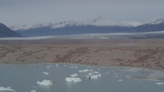 4K aerial stock footage fly over Inner Lake George, approach Chugach Mountains and Knik Glacier, Alaska Aerial Stock Footage | AK0001_0211