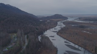 AK0001_0221 - 4K aerial stock footage flying by the river running along Old Glenn Highway, Knik River, Alaska