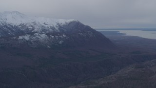 4K aerial stock footage approaching snow capped Chugach Mountains, Alaska Aerial Stock Footage | AK0001_0226