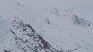 4K aerial stock footage flyby by snow covered peaks, Chugach Mountains, Alaska Aerial Stock Footage | AK0001_0234