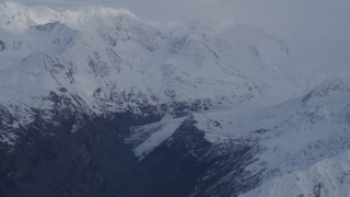 4K aerial stock footage flying over deep valley, approaching a glacier, Chugach Mountains, Alaska Aerial Stock Footage | AK0001_0267