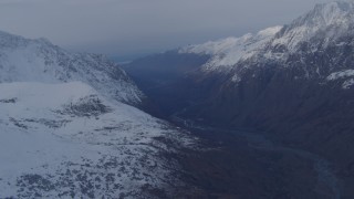 4K aerial stock footage flying by deep valley bordered by the Chugach Mountains, Alaska Aerial Stock Footage | AK0001_0268