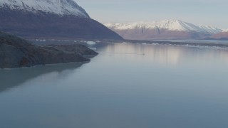 AK0001_0283 - 4K aerial stock footage a seaplane on the lake, Chugach Mountains, Inner Lake George, Alaska