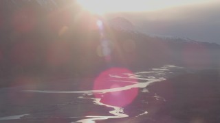 AK0001_0301 - 4K aerial stock footage flying by Old Glenn Highway bridge over Butte end of the Knik River Valley, Alaska