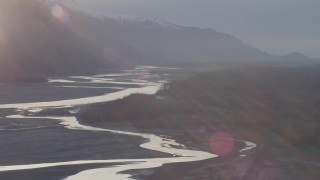 AK0001_0302 - 4K aerial stock footage fly over Butte end, approach Old Glenn Highway bridge, Knik River Valley, Alaska