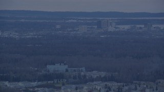 4K aerial stock footage flying by buildings from over neighborhood, Downtown Anchorage, Alaska, twilight Aerial Stock Footage | AK0001_0333