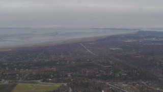 4K aerial stock footage flying by the shore of the Turnagain Arm of the Cook Inlet, Anchorage, Alaska Aerial Stock Footage | AK0001_0345