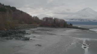 AK0001_0359 - 4K aerial stock footage base of Chugach Mountains, reveal Turnagain Arm of the Cook Inlet, Alaska