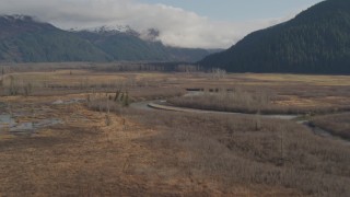 4K aerial stock footage flying over rivers, marshland, approaching train tracks, Portage, Alaska Aerial Stock Footage | AK0001_0384