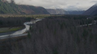 4K aerial stock footage flying low over trees, revealing a river, Portage, Alaska Aerial Stock Footage | AK0001_0387