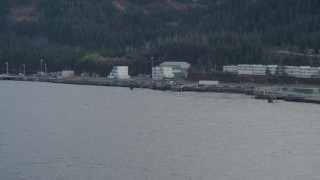 4K aerial stock footage flying low over the bay, approaching the dock, Whittier, Alaska Aerial Stock Footage | AK0001_0397