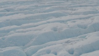 4K aerial stock footage flying low over surface of a glacier, Prince William Sound, Alaska Aerial Stock Footage | AK0001_0439