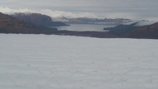 4K aerial stock footage flying low over glacier, approaching a bay, Prince William Sound, Alaska Aerial Stock Footage | AK0001_0440