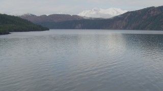 4K aerial stock footage flying low by the mouth of a bay, Prince William Sound, Alaska Aerial Stock Footage | AK0001_0459