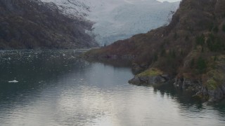 4K aerial stock footage flying low along the shore of the bay, approaching glacier, Blackstone Bay, Alaska Aerial Stock Footage | AK0001_0472