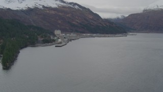 AK0001_0499 - 4K aerial stock footage flying over the bay, approaching docks, Whittier, Alaska