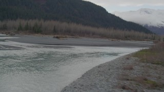 4K aerial stock footage flying low along rivers cutting through forest in the valley, Portage, Alaska Aerial Stock Footage | AK0001_0515